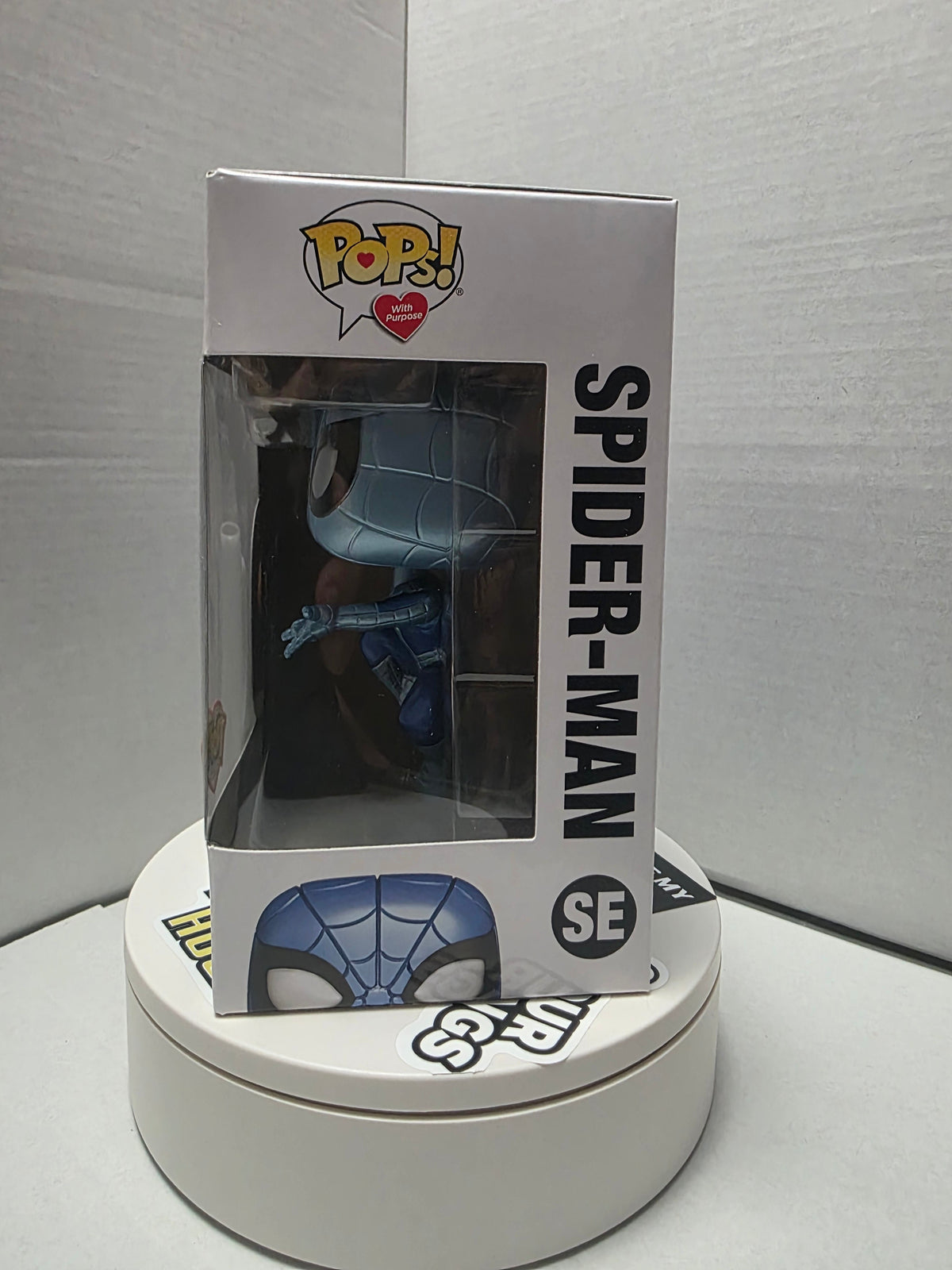 Funko Pop Spider-Man Make-A-Wish SE side panel with Pops With Purpose logo