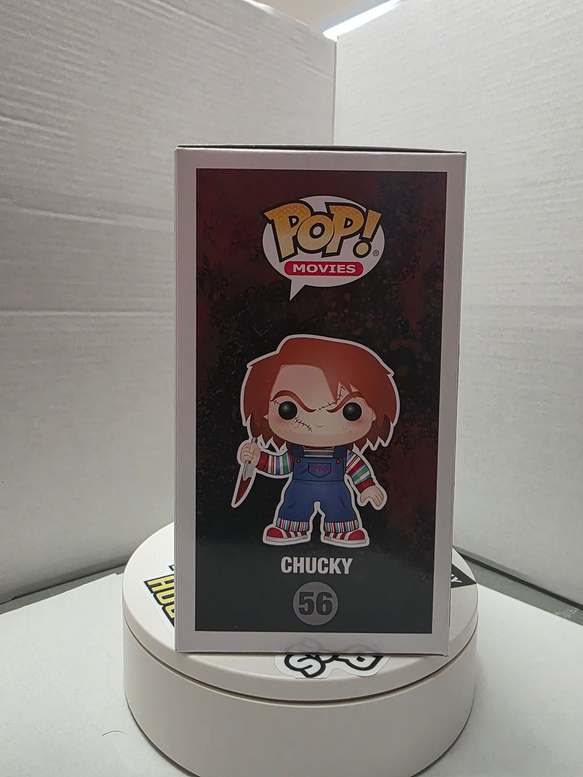 Side of Funko Pop Chucky #56 box showing window and Chucky name