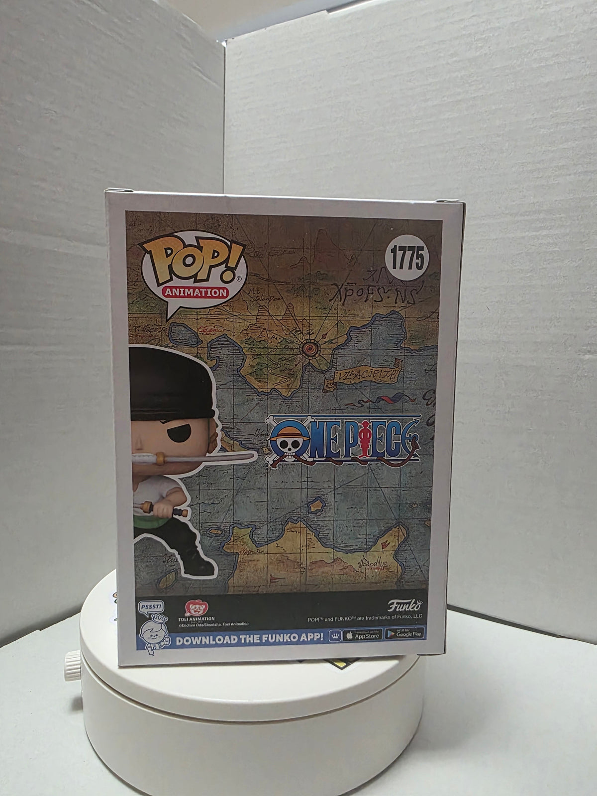 Funko Pop One Piece Roronoa Zoro 1775 back of box with One Piece logo and map art