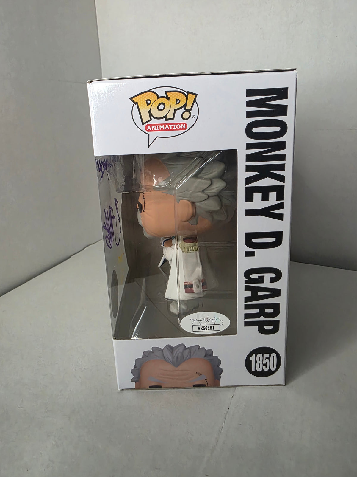 Funko Pop Monkey D. Garp #1850 - Signed by Voice Actor Brian Mathis w/ Quote