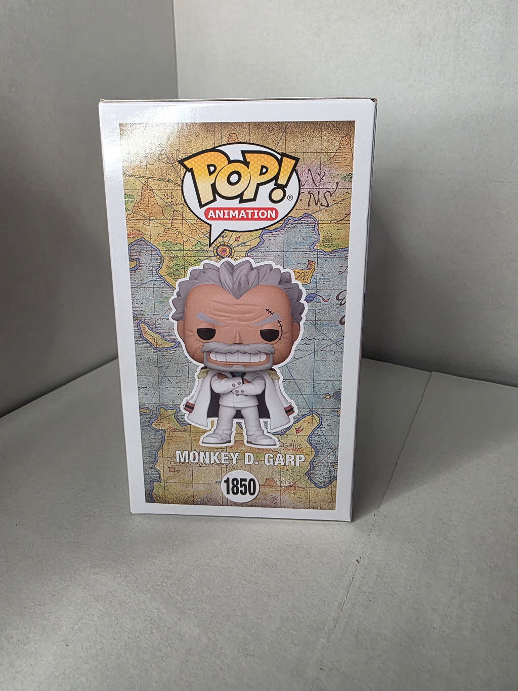 Funko Pop Monkey D. Garp #1850 - Signed by Voice Actor Brian Mathis w/ Quote